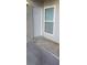 Exterior view of the front door with a window providing natural light to the entryway at 2981 Country Manor Ln # 2, Las Vegas, NV 89115