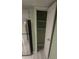 Open door reveals a pantry with shelving for ample storage at 2981 Country Manor Ln # 2, Las Vegas, NV 89115