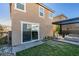 Relaxing backyard featuring a covered patio, modern landscaping, and convenient access from the house at 3192 Bormida Ave, Henderson, NV 89044