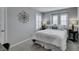 Cozy bedroom with a comfortable bed, neutral colors, and bright natural light at 3192 Bormida Ave, Henderson, NV 89044