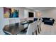 Stylish dining area with seating and views of a modern living space at 3192 Bormida Ave, Henderson, NV 89044