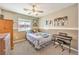 Cozy bedroom with carpet flooring, bright natural light, and neutral color scheme at 3192 Taylor St, Logandale, NV 89021