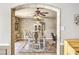 Dining room with a neutral color palette and two ceiling fans at 3192 Taylor St, Logandale, NV 89021