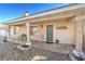 Charming front porch with seating and a welcoming entrance at 3192 Taylor St, Logandale, NV 89021