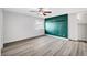 Light and airy bedroom features laminate floors and closet space at 3449 Lorilou Ln # 2, Las Vegas, NV 89121