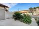 Low maintenance front yard landscaping with desert style plants and bushes at 3449 Lorilou Ln # 2, Las Vegas, NV 89121