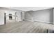 Bright living room adjacent to an updated kitchen and stairs to the upper level at 3449 Lorilou Ln # 2, Las Vegas, NV 89121