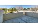 This backyard space features a brick wall and mature foliage and landscaping at 3484 Nightflower Ln # B, Las Vegas, NV 89121