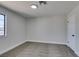 Cozy bedroom with neutral carpeting, freshly painted walls, and a bright window for natural light at 3484 Nightflower Ln # B, Las Vegas, NV 89121