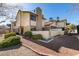 Charming townhouse showcasing manicured landscaping, a private patio with brick perimeter, and inviting curb appeal at 3484 Nightflower Ln # B, Las Vegas, NV 89121