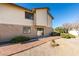 Home exterior featuring a private patio with direct access to the backyard garden, enhancing the living space at 3484 Nightflower Ln # B, Las Vegas, NV 89121
