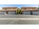 Street view of garages on a sunny day at 3484 Nightflower Ln # B, Las Vegas, NV 89121