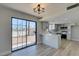 Bright kitchen features modern appliances, light countertops, and large windows at 3484 Nightflower Ln # B, Las Vegas, NV 89121