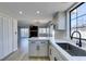 Beautiful kitchen featuring stainless steel appliances, quartz countertops, and modern finishes at 3484 Nightflower Ln # B, Las Vegas, NV 89121