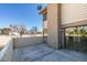 Private patio with a brick fence, providing an ideal space for outdoor relaxation and entertaining with direct access to the house at 3484 Nightflower Ln # B, Las Vegas, NV 89121