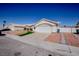 Single-story home featuring desert landscaping, a driveway, and an attached garage at 3916 Tifton Ct, North Las Vegas, NV 89031