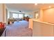 Upstairs living room with comfortable seating and plenty of natural light at 4101 Akira Ave, North Las Vegas, NV 89084