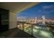 Balcony view of the Las Vegas cityscape at night at 4381 W Flamingo Rd # 2322/2320, Las Vegas, NV 89103