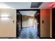 Hallway showing an open doorway into the unit at 4381 W Flamingo Rd # 2322/2320, Las Vegas, NV 89103