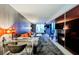 Stylish living room featuring a modern workspace, sleek furniture, and cityscape view at 4381 W Flamingo Rd # 2322/2320, Las Vegas, NV 89103