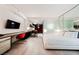 Modern living space with a work desk, kitchenette, and a comfortable bed at 4381 W Flamingo Rd # 2322/2320, Las Vegas, NV 89103