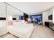 Spacious primary bedroom boasts city views, a king-size bed, and a mirrored wall for added brightness at 4381 W Flamingo Rd # 2322/2320, Las Vegas, NV 89103