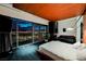 Spacious bedroom with floor-to-ceiling windows and stunning city views at night at 4381 W Flamingo Rd # 5708, Las Vegas, NV 89103