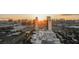 Breathtaking city view of the Palms Resort and Casino with a gorgeous sunrise and surrounding city buildings at 4381 W Flamingo Rd # 5708, Las Vegas, NV 89103