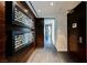 Hallway featuring unique art installations, wood paneling, and modern design elements at 4381 W Flamingo Rd # 5708, Las Vegas, NV 89103