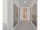 Hallway with mirrored sliding doors, and access to ensuite bathroom at 4525 Dean Martin Dr # 607, Las Vegas, NV 89103