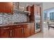 Contemporary kitchen boasts stainless steel appliances and mosaic backsplash at 4525 Dean Martin Dr # 607, Las Vegas, NV 89103