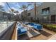 Community outdoor seating area with blue cushioned seating at 4525 Dean Martin Dr # 607, Las Vegas, NV 89103