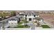 Expansive aerial view of a modern home showcasing its desert surroundings and landscaping at 500 Trenier Dr, Henderson, NV 89002