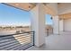 Spacious balcony with modern railings and stunning views of the desert landscape at 500 Trenier Dr, Henderson, NV 89002