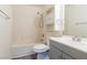 Bathroom with a tub, shower, toilet, and single vanity sink at 5282 Panguitch Dr, Las Vegas, NV 89122