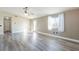 Empty living room featuring gray flooring and natural light at 5282 Panguitch Dr, Las Vegas, NV 89122