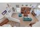 Second floor living room with vaulted ceiling, fan, and built-in cabinets at 6005 Crystal Talon St, Las Vegas, NV 89130