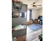 ' bedroom features a bunk bed, ceiling fan, and cheerful decor at 603 Virginia Way, Indian Springs, NV 89018