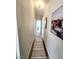 Hallway with decorative rug and accent wall art at 603 Virginia Way, Indian Springs, NV 89018