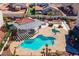 Aerial view of community pool including a pergola, and lush landscaping at 6201 E Lake Mead Blvd # 156, Las Vegas, NV 89156