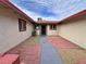 A walkway leading to the front door in a courtyard setting at 6216 Bullion Blvd, Las Vegas, NV 89103