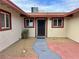 A walkway leading to the front door in a courtyard setting at 6216 Bullion Blvd, Las Vegas, NV 89103