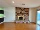 Brick fireplace with hearth and mantle in large open living space at 6216 Bullion Blvd, Las Vegas, NV 89103