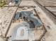 Desert home under construction boasting an expansive driveway and modern design at 6383 Horse Dr, Las Vegas, NV 89131
