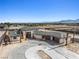 Stunning view of a desert estate under construction with mountain range in background at 6383 Horse Dr, Las Vegas, NV 89131