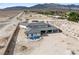 Expansive desert home showcasing outdoor potential with views of the Las Vegas landscape at 6383 Horse Dr, Las Vegas, NV 89131
