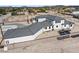 Desert property featuring a modern house with a spacious lot and beautiful views at 6383 Horse Dr, Las Vegas, NV 89131