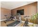 Well-equipped home gym featuring a treadmill, bike, elliptical and statement wall at 6383 Horse Dr, Las Vegas, NV 89131