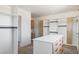 Spacious walk-in closet with custom cabinets, drawers and shelving at 6383 Horse Dr, Las Vegas, NV 89131