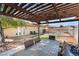 Inviting backyard oasis featuring a pool, patio, pergola, and outdoor dining area at 6408 Starcrest Dr, Las Vegas, NV 89108